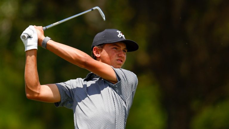 Miles Russell of the United States hits from the 17th tee during the final round of the LECOM Suncoast Classic at Lakewood National Golf Club Commander on April 21, 2024 in Lakewood Ranch, Florida. The 15-year-old golfer made history by becoming the youngest player to make the cut on the Korn Ferry Tour. (Douglas P. DeFelice/Getty Images)