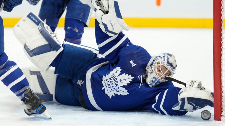 Toronto Maple Leafs goaltender Ilya Samsonov (35) reaches back to make a save against the Florida Panthers during first period NHL hockey action in Toronto on Monday, April 1, 2024. (Frank Gunn/CP)