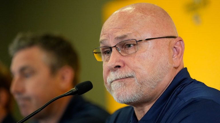 FILE -Nashville Predators incoming general manager Barry Trotz responds to questions during a news conference at the NHL hockey team's arena Wednesday, May 31, 2023, in Nashville, Tenn. Barry Trotz never put a label on whether he was rebuilding, retooling or simply trying to reset the Nashville Predators during his first season as general manager. (George Walker IV/AP)