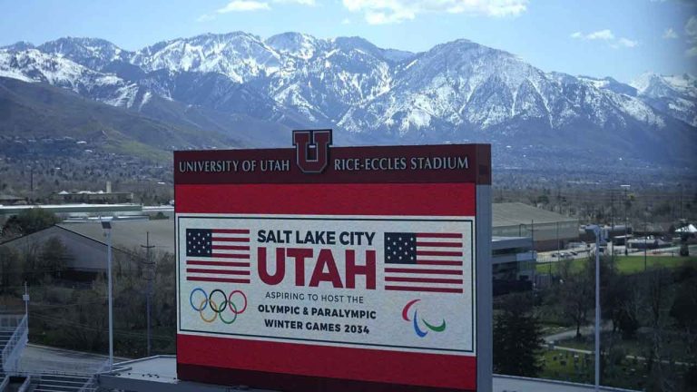 The scoreboard at the University of Utah's Rice-Eccles Stadium promotes Salt Lake City's bid to host another Winter Olympics in 2034 as International Olympic Committee members prepare to tour the stadium. (Rick Bowmer/AP)