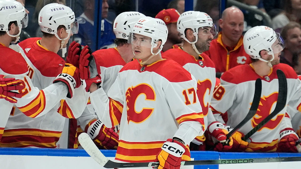 Flames’ Sharangovich exits vs. Jets after awkward fall