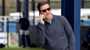 Toronto Blue Jays GM Ross Atkins takes a phone call during Spring Training action in Dunedin, Fla., Thursday, Feb. 15, 2024. (Frank Gunn/CP)