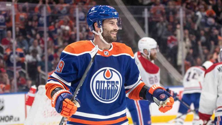 Edmonton Oilers' Adam Henrique (19) celebrates a goal against the Montreal Canadiens during second period NHL action in Edmonton on Tuesday March 19, 2024. (Jason Franson/CP)