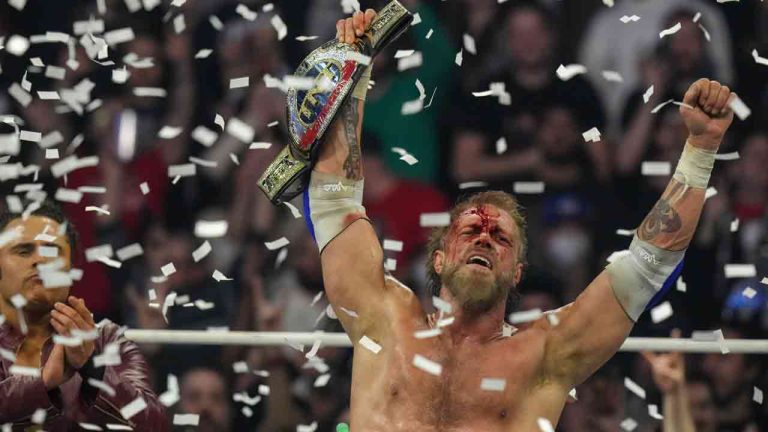 Canadian wrestler Adam Copeland reacts as he is declared the winner of his match with fellow Canadian and former tag partner Christian Cage during All Elite Wrestling's Dynamite/Rampage card in Toronto, on Wednesday, March 20, 2024. (Chris Young/CP)