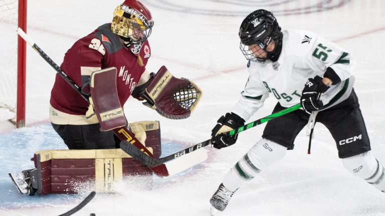 Montreal's Melodie Daoust (25) stops a shot by Boston's Kelly Babstock (55) during second period PWHL playoff hockey action in Laval, Que., on Saturday, May 11, 2024. THE CANADIAN PRESS/Christinne Muschi 