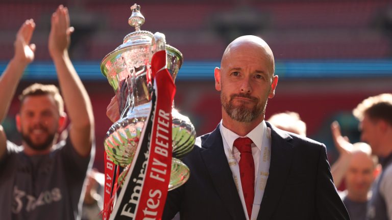 Manchester United's head coach Erik ten Hag celebrates with the trophy after winning the English FA Cup final soccer match between Manchester City and Manchester United at Wembley Stadium in London, Saturday, May 25, 2024. (Ian Walton/AP) 