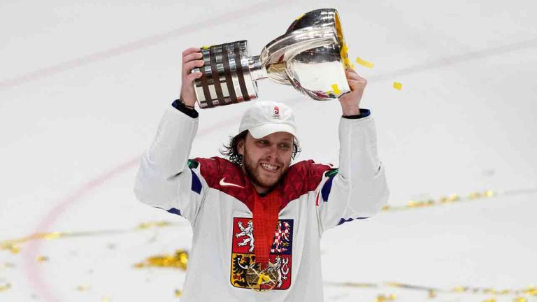 Czech Republic's David Pastrnak celebrates with their trophy after they defeated Switzerland 2-0 in a gold medal match at the Ice Hockey World Championships in Prague, Czech Republic, Sunday, May 26, 2024. (Darko Vojinovic/AP)