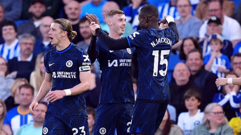 Chelsea's Cole Palmer celebrates after scoring the opening goal during the English Premier League soccer match between Brighton and Hove Albion and FC Chelsea in Brighton and Hove, England, Wednesday, May 15, 2024. (Adam Davy/PA via AP)