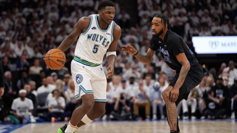 Minnesota Timberwolves guard Anthony Edwards (5) drives against Dallas Mavericks forward Derrick Jones Jr. (55) during the second half of Game 2 of the NBA basketball Western Conference finals, Friday, May 24, 2024, in Minneapolis. (Abbie Parr/AP)