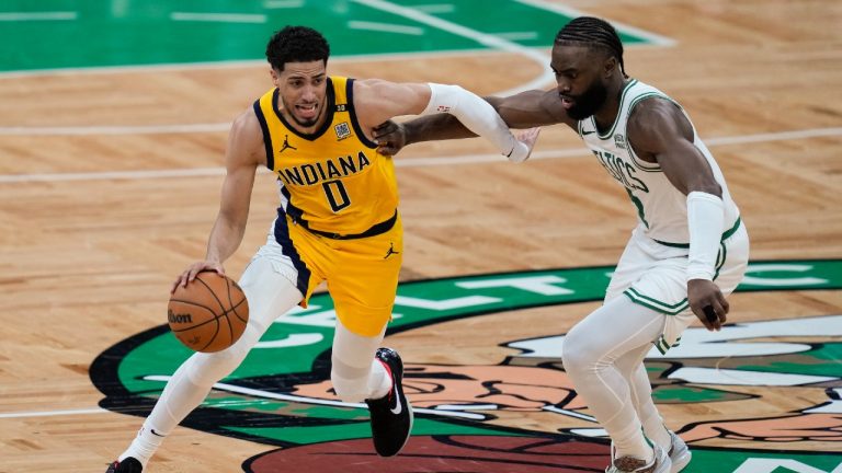 Indiana Pacers guard Tyrese Haliburton (0) drives against Boston Celtics guard Jaylen Brown (7) during the third quarter of Game 2 of the NBA Eastern Conference basketball finals. (Charles Krupa/AP)