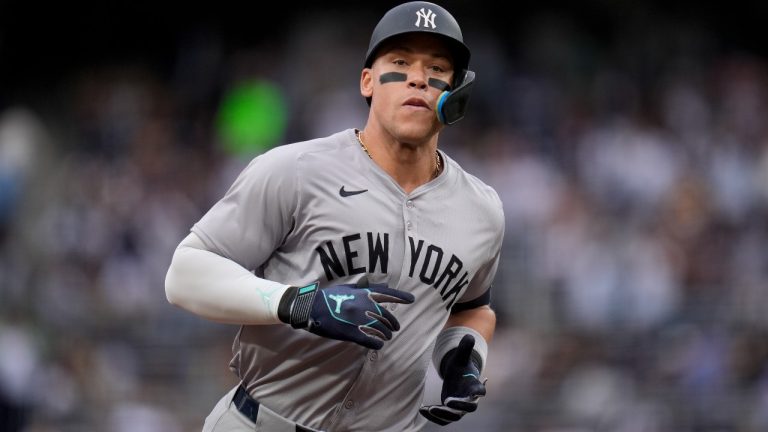 New York Yankees' Aaron Judge celebrates after hitting a two-run home run during the first inning of a baseball game against the San Diego Padres, Saturday, May 25, 2024, in San Diego. (Gregory Bull/AP)