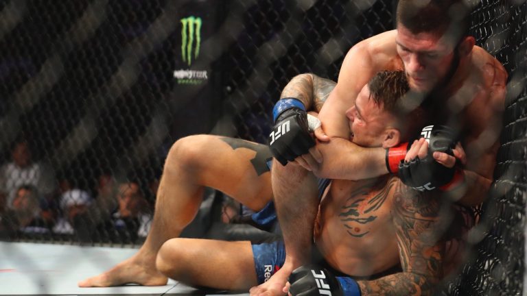 Khabib Nurmagomedov attempts a choke hold on Dustin Poirier at UFC 242, in Yas Mall in Abu Dhabi, United Arab Emirates in 2019. (Mahmoud Khaled/AP)