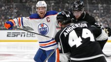 Kings&#8217; Mikey Anderson exits, then returns in Game 5 after colliding with Oilers&#8217; McDavid