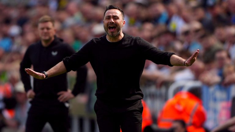 Brighton's manager Roberto De Zerbi gestures, during the English Premier League soccer match between Newcastle United and Brighton & Hove Albion, at St. James' Park, in Newcastle, England, Saturday May 11, 2024. (Owen Humphreys/PA via AP)