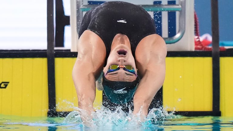 Kylie Masse powers through the water as she wins the women's 100m backstroke during the Canadian Olympic Swim Trials in Toronto on Wednesday, May 15, 2024. (Nathan Denette/CP)