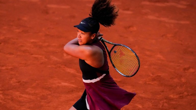 Naomi Osaka marked her seventh French Open appearance with a first-round victory over Lucia Bronzetti. (Manu Fernandez/AP)