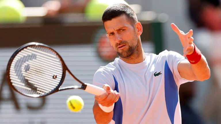 Serbia's Novak Djokovic returns the ball during a training session at the Roland Garros stadium, Saturday, May 25, 2024 in Paris. The French Open tennis tournament starts Sunday May 26, 2024. (AP Photo/Jean-Francois Badias)