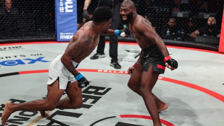 Cédric Doumbé smiles at Jaleel Willis as he dodges an attack at a Bellator Champions Series event in France. (PFL MMA)