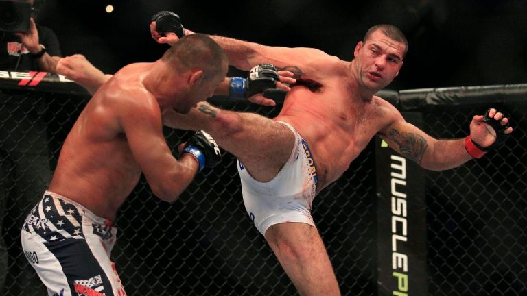 Mauricio Rua, right, kicks Dan Henderson during the third round of a UFC 139 Mixed Martial Arts light heavyweight bout in San Jose, Calif., Saturday, Nov. 19, 2011. Henderson won by unanimous decision. (Jeff Chiu/AP Photo)