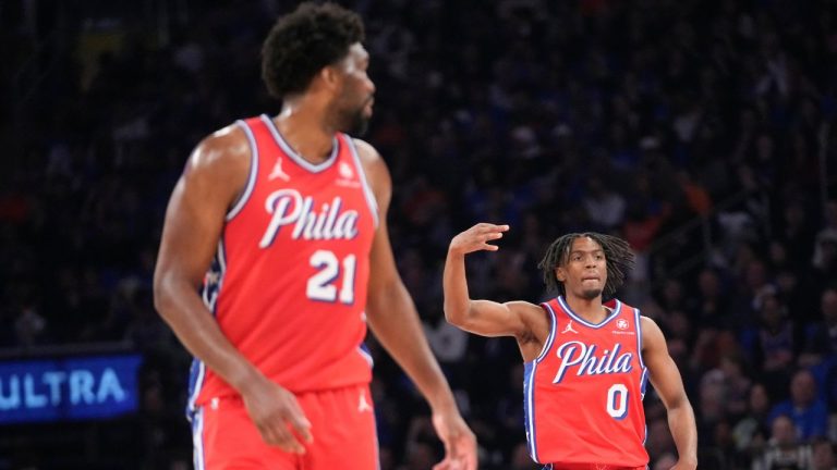 Philadelphia 76ers guard Tyrese Maxey and centre Joel Embiid react after Maxey scored a 3-point basket during the first half in Game 1 of an NBA basketball first-round playoff series against the New York Knicks, Saturday, April 20, 2024, at Madison Square Garden in New York. (Mary Altaffer/AP Photo)