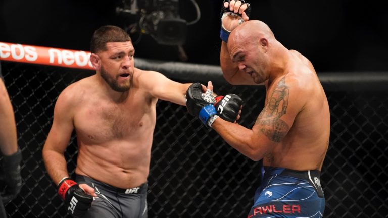 Nick Diaz, left, fights Robbie Lawler during a mixed martial arts bout at UFC 266 in 2021 in Las Vegas. (John Locher/AP)