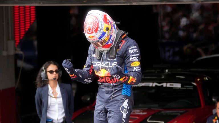 Red Bull driver Max Verstappen of the Netherlands celebrates after winning the Italy's Emilia Romagna Formula One Grand Prix race at the Dino and Enzo Ferrari racetrack in Imola, Italy, Sunday, May 19, 2024. (AP/Luca Bruno)