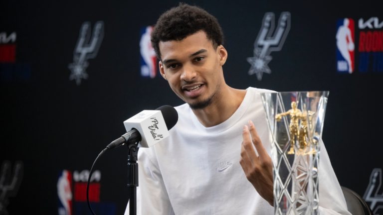 San Antonio Spurs' Victor Wembanyama speaks to media after receiving his 2023-24 NBA Rookie of the Year trophy during an NBA basketball news conference, Saturday, May 11, 2024, in San Antonio. (Darren Abate/AP)