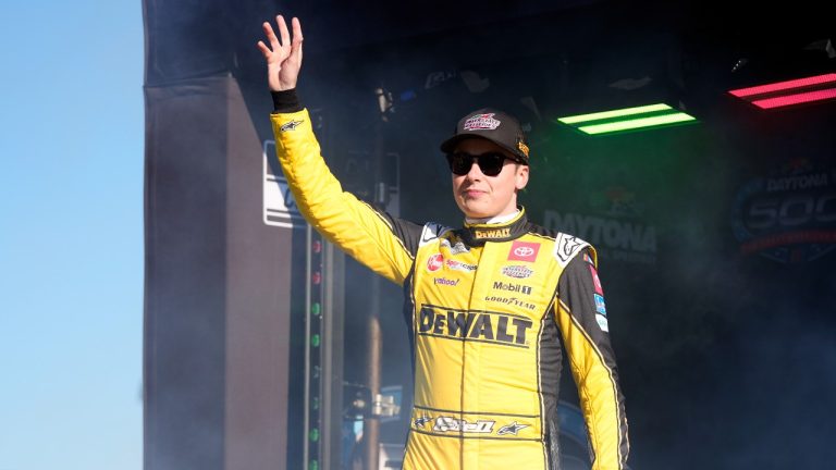 Christopher Bell waves to fans during driver introductions for the NASCAR Daytona 500 auto race at Daytona International Speedway, Monday, Feb. 19, 2024, in Daytona Beach, Fla. (John Raoux/AP Photo)