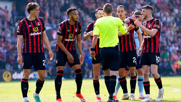 Bournemouth players appeal to referee Matt Donohue after he awards a penalty to Brentford A VAR check overturns the decision , during the English Premier League soccer match between Brentford and Bournemouth, at the Vitality Stadium, in Bournemouth, England, Saturday, May 11, 2024. (Andrew Matthews/PA via AP)