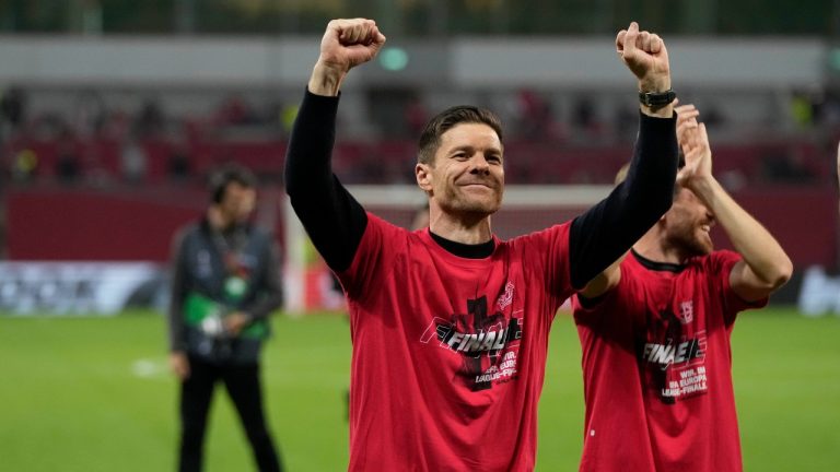 Leverkusen's head coach Xabi Alonso celebrates at the end of the Europa League second leg semi-final soccer match between Leverkusen and Roma at the BayArena in Leverkusen, Germany, Thursday, May 9, 2024. (Matthias Schrader/AP Photo)