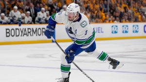 Vancouver Canucks centre J.T. Miller (9) plays against the Nashville Predators during the first period in Game 3 of an NHL hockey Stanley Cup first-round playoff series Friday, April 26, 2024, in Nashville, Tenn. (George Walker IV/AP)