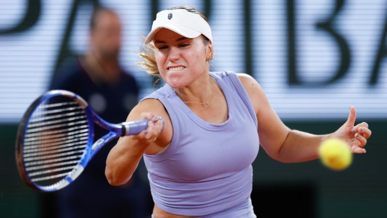 Sofia Kenin of the U.S. plays a shot against France's Caroline Garcia during their second round match of the French Open tennis tournament at the Roland Garros stadium in Paris, Wednesday, May 29, 2024. (Jean-Francois Badias/AP)