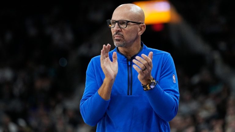 Dallas Mavericks coach Jason Kidd applauds a play during the second half of the team's NBA basketball game against the San Antonio Spurs in San Antonio, Wednesday, Oct. 25, 2023. (Eric Gay/AP)