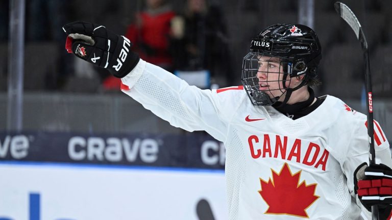 Canada's Macklin Celebrini celebrates scoring during the IIHF World Junior Championship group A ice hockey match between Latvia and Canada at Scandinavium in Gothenburg, Sweden, Wednesday, Dec. 27, 2023. (Bjorn Larsson Rosvall/TT News Agency via AP)