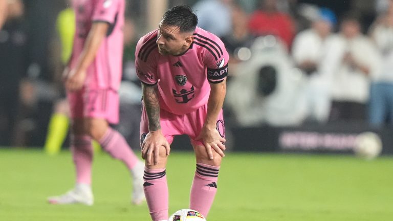 Inter Miami forward Lionel Messi stands with the ball during the first half of an MLS soccer match against D.C. United, Saturday, May 18, 2024, in Fort Lauderdale, Fla. (Lynne Sladky/AP)