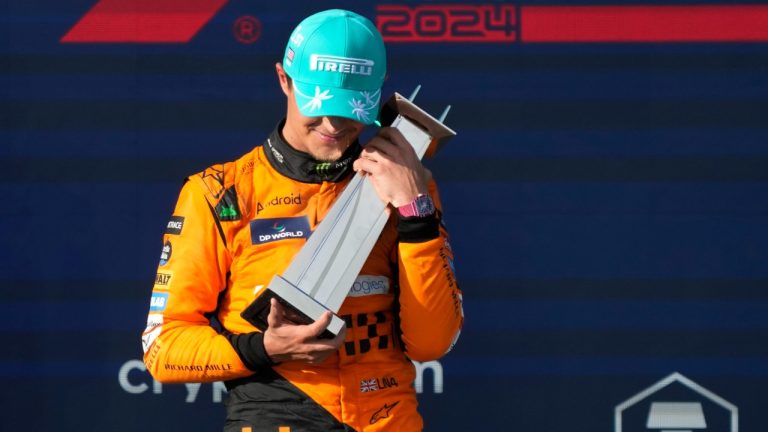 McLaren driver Lando Norris, of Britain, celebrates after winning the Formula One Miami Grand Prix auto race at the Miami International Autodrome, Sunday, May 5, 2024, in Miami Gardens, Fla. (Wilfredo Lee/AP)