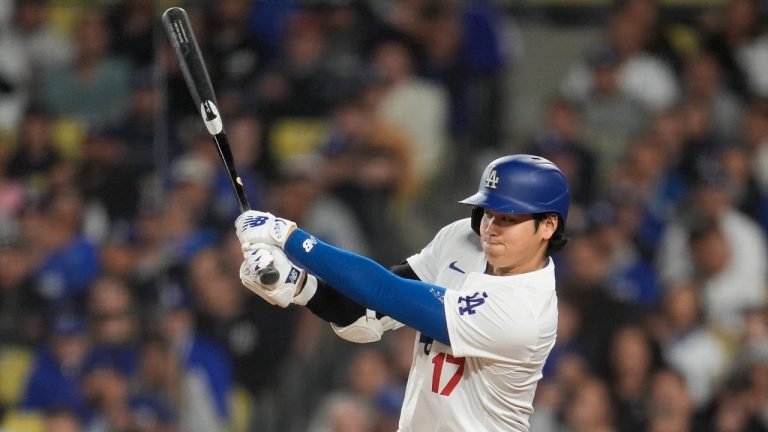 Los Angeles Dodgers' Shohei Ohtani connects for a single during the sixth inning of a baseball game against the Arizona Diamondbacks, Tuesday, May 21, 2024, in Los Angeles. (Marcio Jose Sanchez/AP)