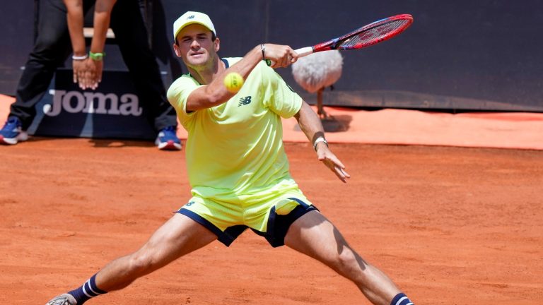 Tommy Paul of the United States' returns the ball to Poland's Hubert Hurkazc at the Italian Open tennis tournament, in Rome, Thursday, May 16, 2024. (Andrew Medichini/AP)