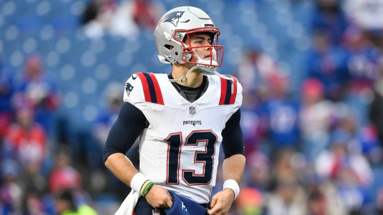 New England Patriots quarterback Nathan Rourke (13) warms up before an NFL football game against the Buffalo Bills in Orchard Park, N.Y., Sunday, Dec. 31, 2023. (Adrian Kraus/AP)