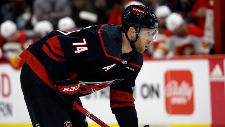 Carolina Hurricanes' Jaccob Slavin (74) watches the puck against the Calgary Flames during the second period of an NHL hockey game in Raleigh, N.C., Sunday, March 10, 2024. (Karl B DeBlaker/AP)