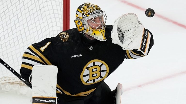 Boston Bruins' Jeremy Swayman makes a glove save during the third period in Game 6 of an NHL hockey Stanley Cup second-round playoff series against the Florida Panthers, Friday, May 17, 2024, in Boston. (Michael Dwyer/AP)