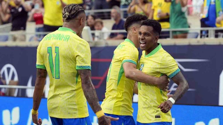 Brazil forward Rodrygo (10) celebrates his goal against the United States with forward Raphinha (11) and midfielder Joao Gomes during the first half of an international friendly soccer match Wednesday, June 12, 2024, in Orlando, Fla. (John Raoux/AP)