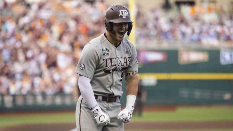 Texas A&M's Gavin Grahovac celebrates after hitting a solo home run against Tennessee during the first inning of Game 1 of the NCAA College World Series baseball finals in Omaha, Neb., Saturday, June 22, 2024. (Rebecca S. Gratz/AP)