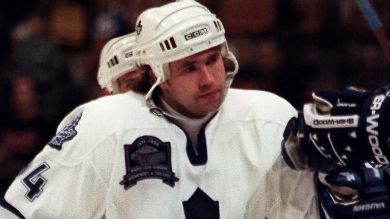 Toronto Maple Leaf's' rightwinger Sergei Berezin is congratulated by teammates at the bench after his first period goal during NHL action against the New Jersey Devils in Toronto Wednesday, March 3, 1999. (Rene Johnston/CP)