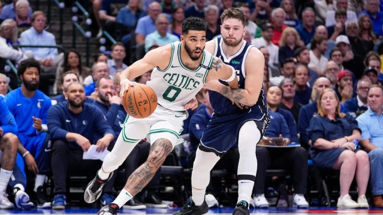 Boston Celtics forward Jayson Tatum, left, drives against Dallas Mavericks guard Luka Doncic during the second half in Game 3 of the NBA basketball finals, Wednesday, June 12, 2024, in Dallas. (Tony Gutierrez/AP)