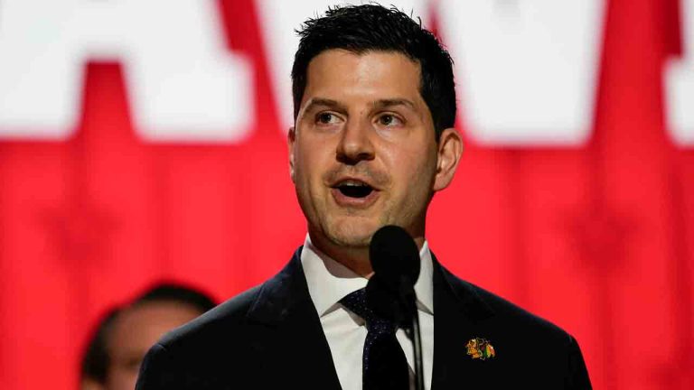 Chicago Blackhawks general manager Kyle Davidson announces the team's first overall pick Connor Bedard during the first round of the NHL hockey draft, Wednesday, June 28, 2023, in Nashville, Tenn. (George Walker IV/AP)