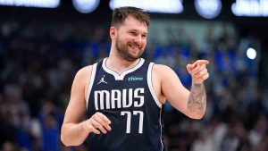 Dallas Mavericks guard Luka Doncic (77) reacts to a play during the second half in Game 3 of the NBA basketball Western Conference finals against the Minnesota Timberwolves, Sunday, May 26, 2024, in Dallas. (Julio Cortez/AP)