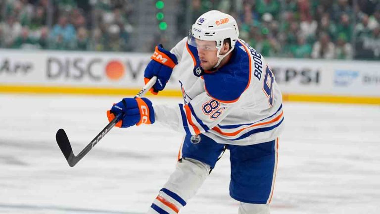 Edmonton Oilers defenceman Philip Broberg shoots against the Dallas Stars during the second period of Game 5 of the Western Conference finals in the NHL hockey Stanley Cup playoffs Friday, May 31, 2024, in Dallas. (Julio Cortez/AP)