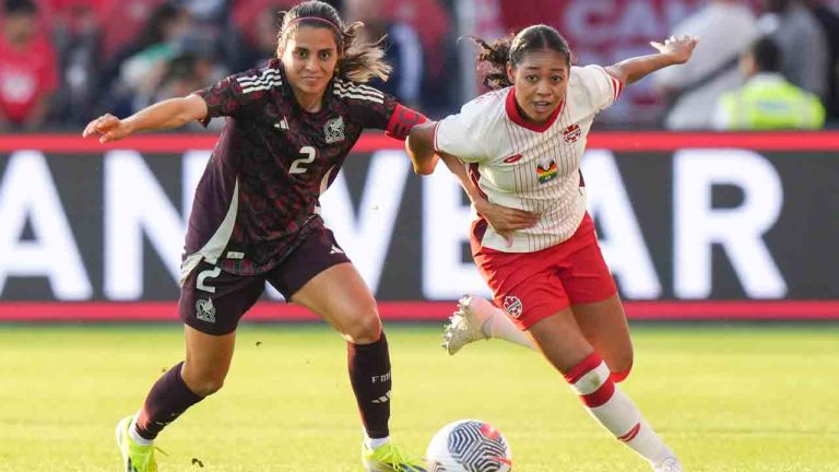 Canada's Jayde Riviere holds off Mexico's Kenti Robles during first half International friendly action in Toronto, on Tuesday, June 4, 2024. (Chris Young/CP)