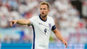 England's Harry Kane points out during a Group C match between Denmark and England at the Euro 2024 soccer tournament in Frankfurt, Germany, Thursday, June 20, 2024. (Michael Probst/AP) 